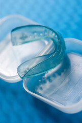 Close-up of a gum shield on a plastic box 