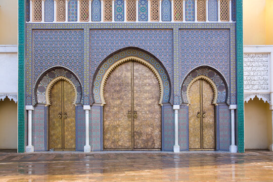 Golden doors and ornate tile work of the Royal Palace in Fez, Morocco
