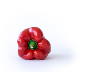 red bell sweet pepper on white