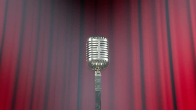 A vintage microphone on the stage. Old classic mic in the theatre. Show.Closeup