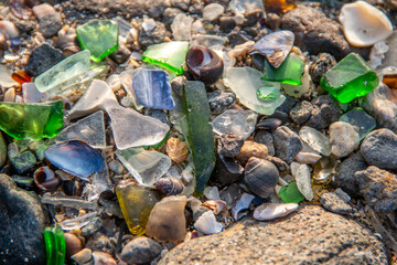 Sea glass on the beach in the summer