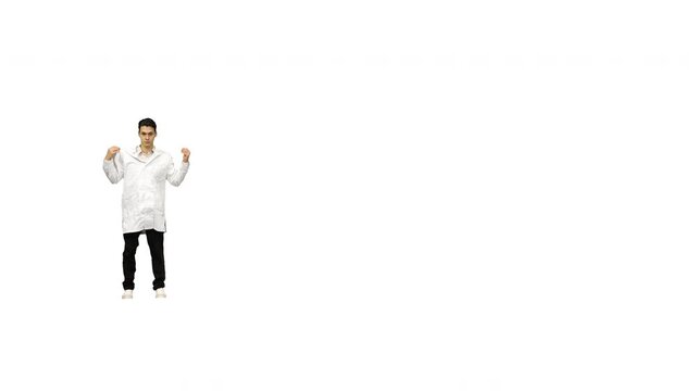 Young male doctor doing back flips, adjusts his robe looking at camera and then walks away on white background.