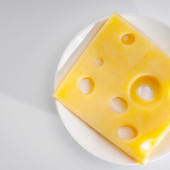 High angle view of a slice of emmenthal cheese