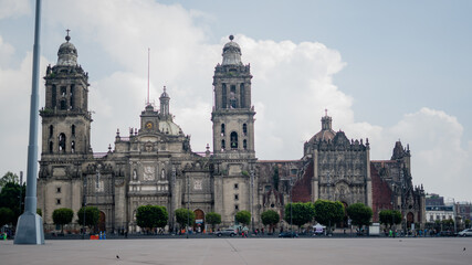 Fototapeta na wymiar The Cathedral of Mexico City and Part of the Constitution Square With a Cloudy Sky in the Background