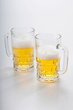 Close-up of two mugs of beer