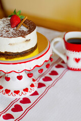 High angle view of a chocolate mousse pastry with a cup of coffee