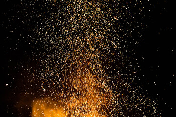 Fototapeta na wymiar Chunks burning at Feast in the Forest Romania, burning wood / Wood fire at Forest Party Romania, burning wood