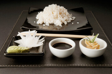 Soy sauce and wasabi paste with pickled ginger and white rice 