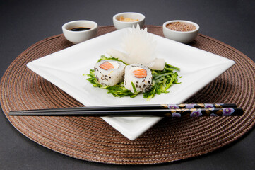 High angle view of sushi served with condiments