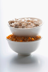Close-up of assorted lentils and beans in bowls