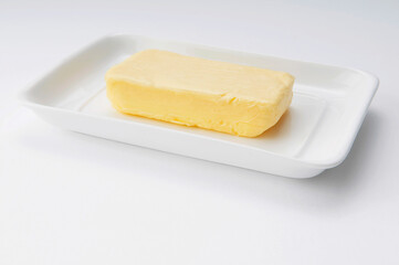 Close-up of butter on a white tray