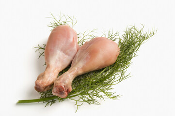 Close-up of raw chicken with herbs