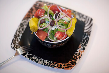 High angle view of a salad with peppers and olives