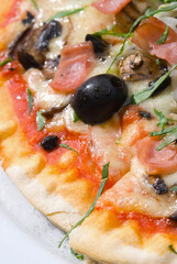 High angle view of an olive on pizza