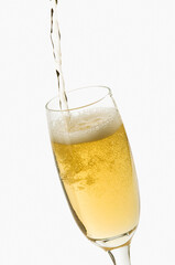 Close-up of champagne being poured into a champagne flute