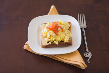 High angle view of scrambled eggs on toast
