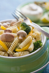 Close-up of pasta with a fork