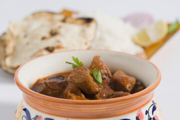 Close-up of mutton curry served with rice