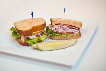 High angle view of sandwiches with pickles