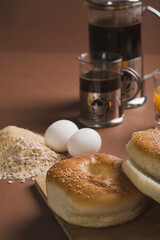 Close-up of breads with eggs and coffee