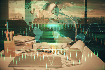 Double exposure of stock market graph drawing and office interior background. Concept of financial...