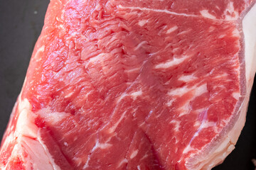 Close up of a raw strip steak 