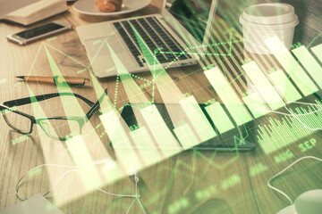 Obraz premium Double exposure of financial graph drawing and cell phone background. Concept of forex trading