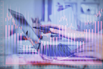 Multi exposure of woman hands typing on computer and financial graph hologram drawing. Stock market analysis concept.