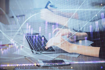 Multi exposure of woman hands typing on computer and financial chart hologram drawing. Stock market analysis concept.