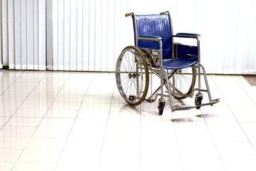 Fototapeta na wymiar Wheelchair for patients waiting for services in hospital hallway, Selective focus 
