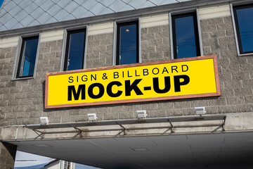 Mock up horizontal outdoors billboard on panel of building