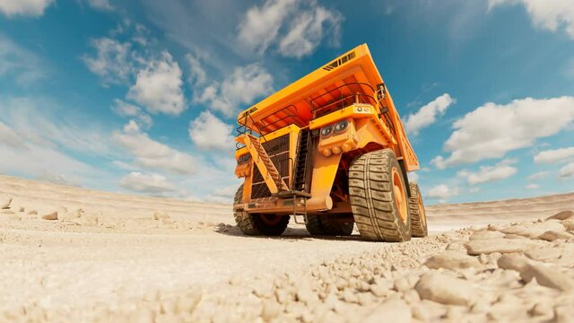Animation of the yellow dump truck driving through the vast dig site. 4K HD