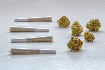 Pre-Rolls Cannabis Joints and dried flower marijuana on a clear background