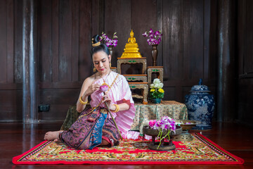 Fototapeta premium woman holding pink lotus