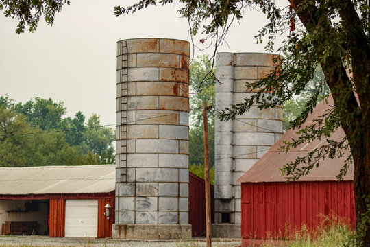 red barn and silo on farm