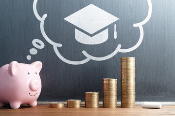 Student loan and tuition. Saving money for education. Stack of coins and piggy bank. Academic cap...