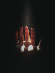 hand and light