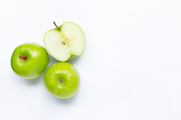 Green apples on white background. Copy space