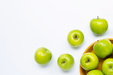Green apples on white background. Copy space