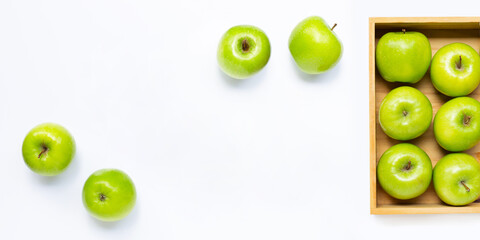 Green apples on white background. Copy space