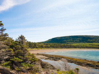 Fototapeta na wymiar Beautiful day on the shores of Saint Lawrence river, Bic National park, Quebec, Canada