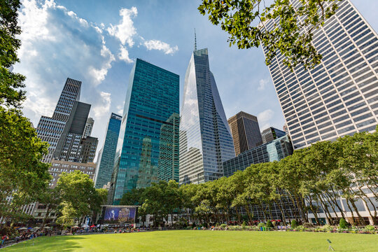 New York, USA - 10 July 2017: View of skyscrapers around Bryant Park in midtown Manhattan at sunny day.