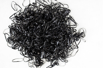 Messy disposable black rubber bands