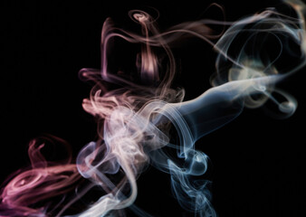 Obraz premium Colorful smoke curve on black background