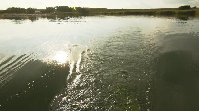 Traces of a motor yacht. water waves on the lake from a yacht motor