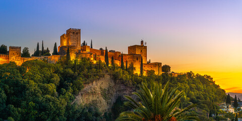 Granada, Spain. October 17th, 2020. View at sunset from below of the buildings and towers of the...