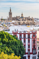Fototapeta premium Seville, Spain. October 15th, 2019. View from Metropol Parasol on the hauses roofs and further on the Church of the Divino Salvador.