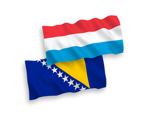 Flags of Bosnia and Herzegovina and Luxembourg on a white background