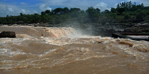 Indian river water flow on raining season.