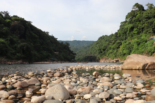 View of the beautiful tourist attractions Jaflong along India-Bangladesh trans-boundary Piyain river in Sylhet with water and rocks